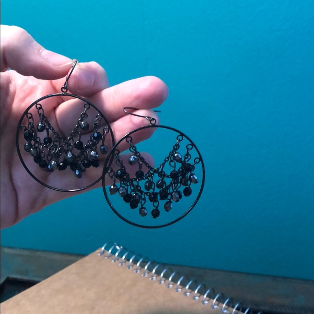 Pair of black and gray dangle earrings
